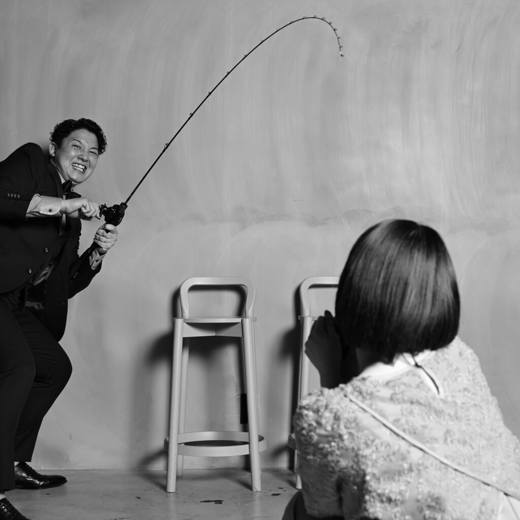 釣竿を使ったカップルフォト